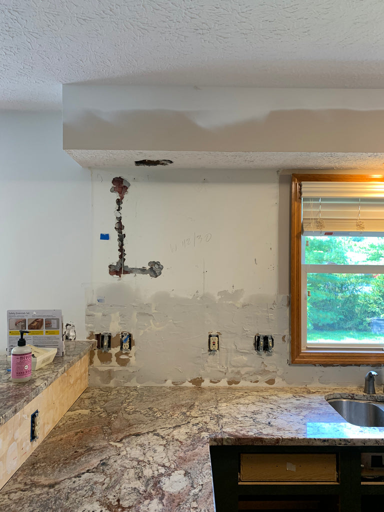 Kitchen Kitchen Progress image showing cabinet removed 