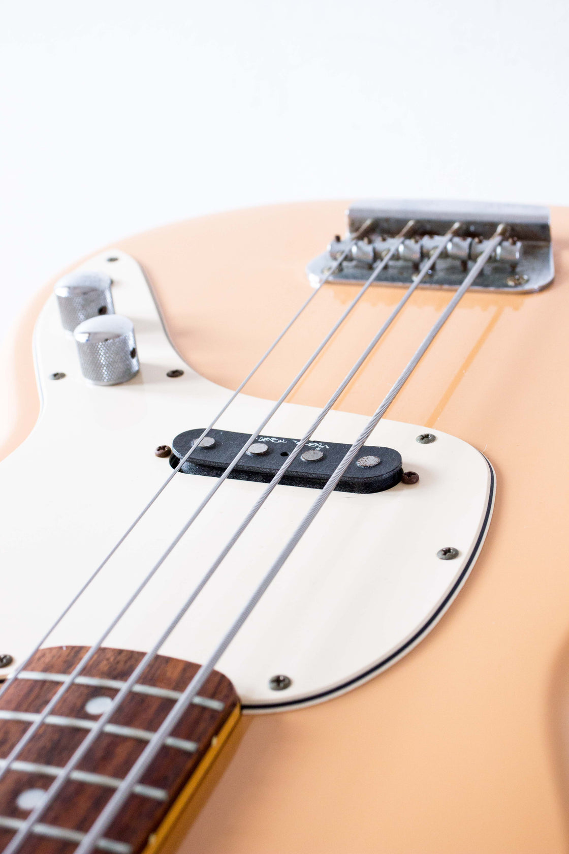 a pink squier vista musicmaster bass