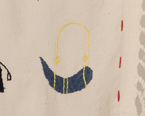 Embroidery of a buffalo horn