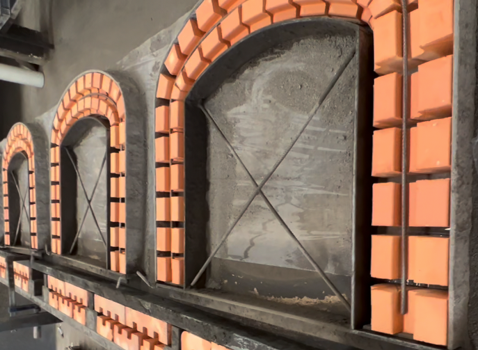 Terracotta pizza oven faces built in Portugal