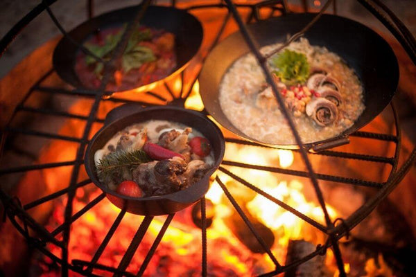 Cooking with cast iron skillets on a fire pit