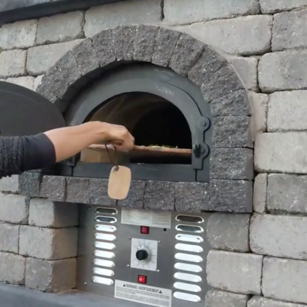 Taking Pizza out of a Brick Oven