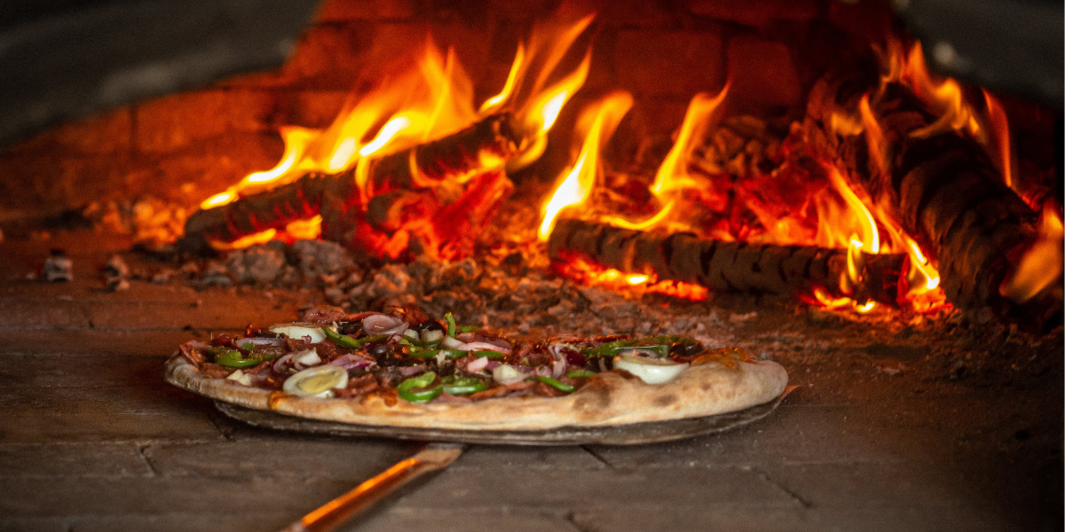 Pizza Cooking in a Wood Fired Oven