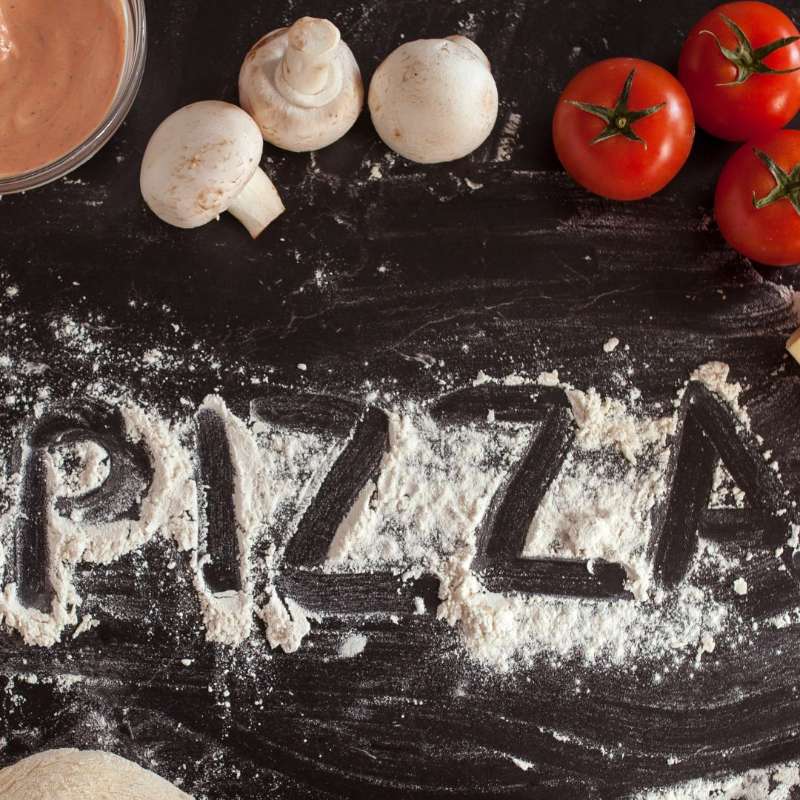 Flour with pizza spelled in it