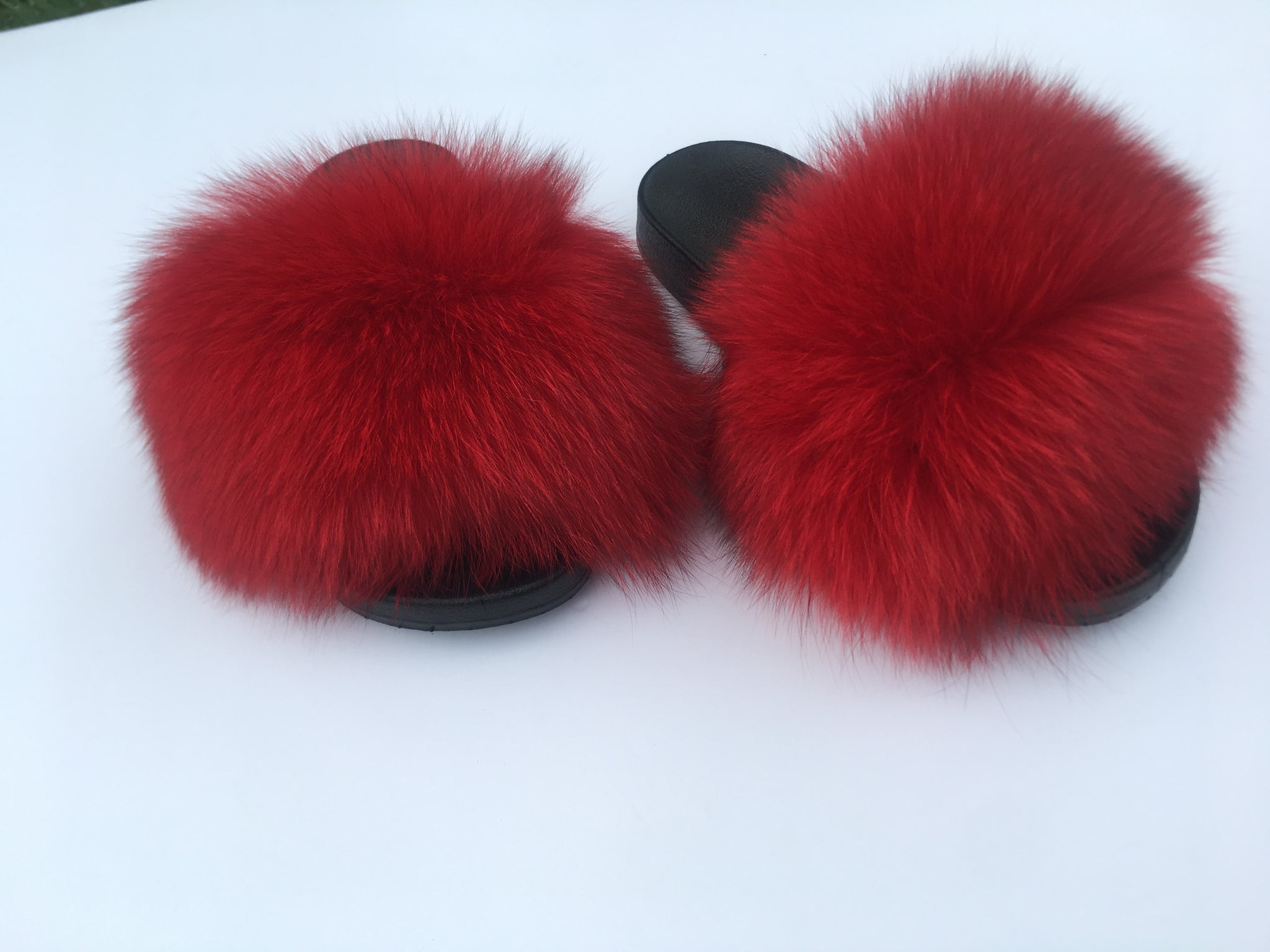 red faux fur slides