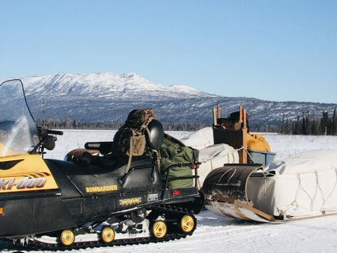 snowmobile with wood toboggan