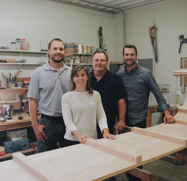 Wooden sled making family