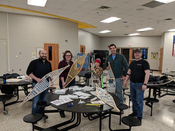 Group with their laced Northern Toboggan Snowshoes