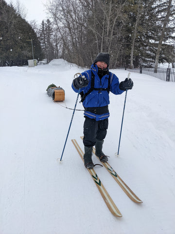 boy on wooden skis