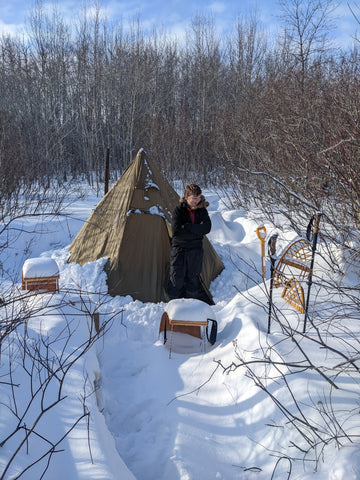 tent and boy in snow