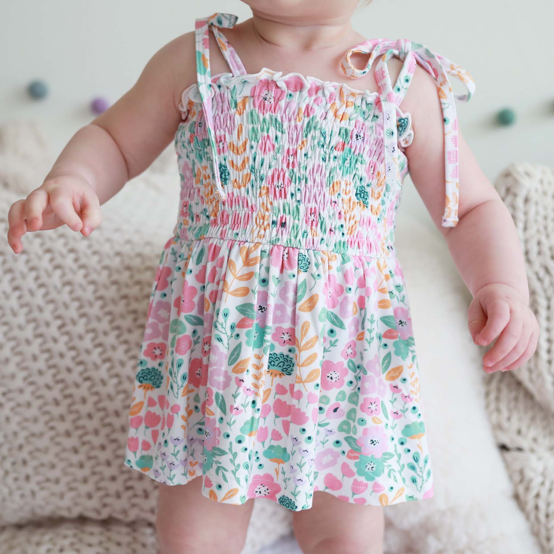 Image of Smocked Twirl Bodysuit | Willow's Whimsy Floral