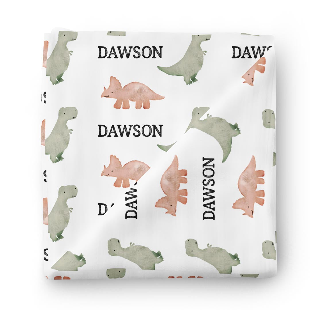 Dawsons Dino Personalized Baby Name Swaddle Blanket Caden Lane