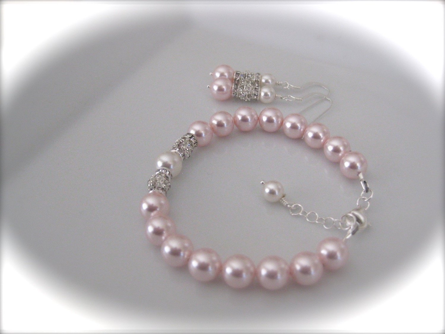 pink pearl bracelet and earrings