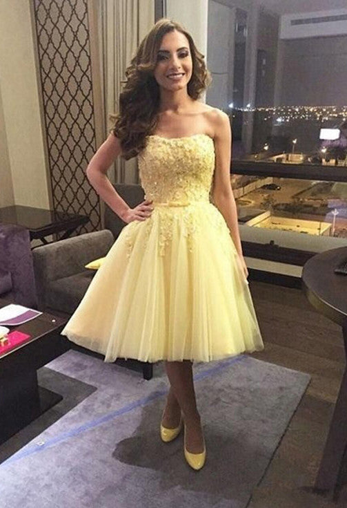 strapless yellow prom dress