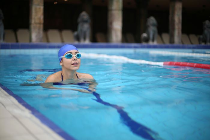 Runner engaging in cross-training by swimming.
