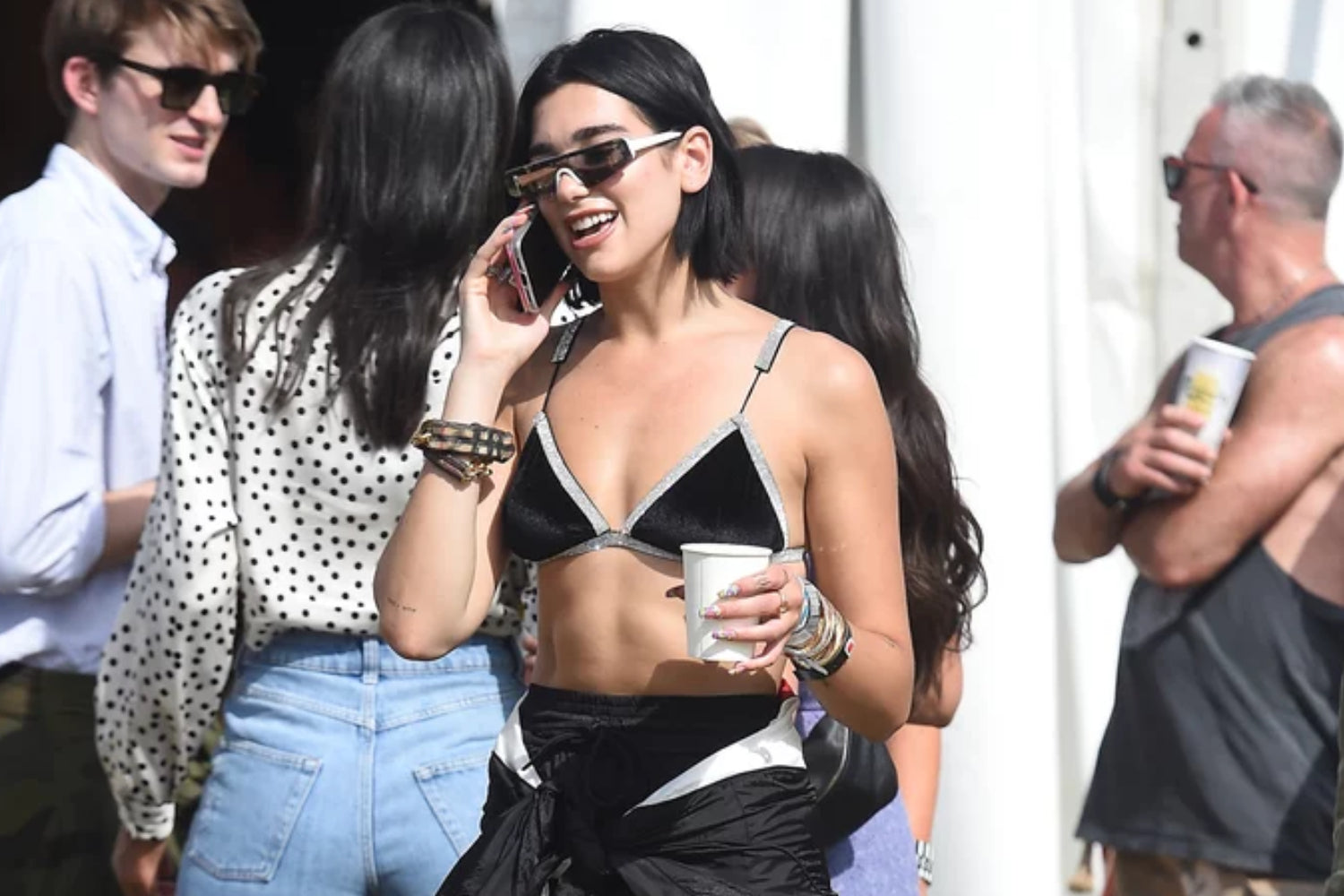 Dua Lipa in black sunglasses