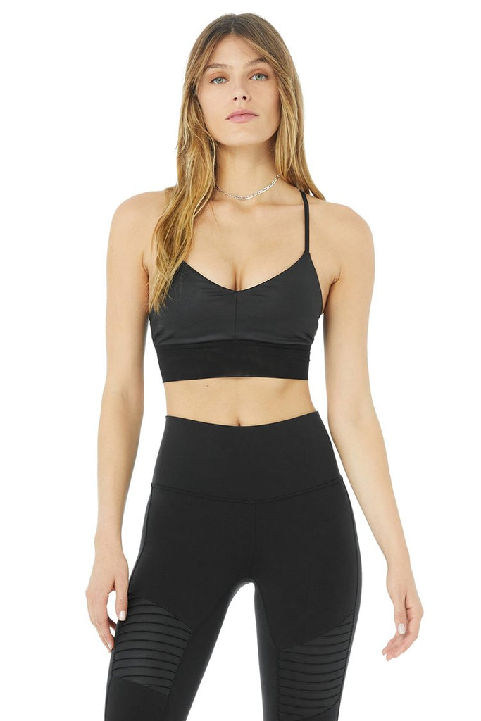 Alo Yoga - SHOP THIS LOOK: ON LEFT: Entice Bra, White:   Intention Pant, Black:   MIDDLE: Interlace Bra, White:   Intention