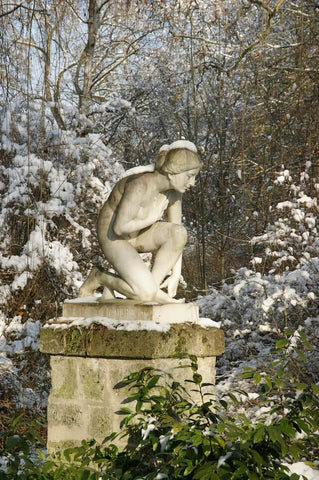 cast stone statue in winter