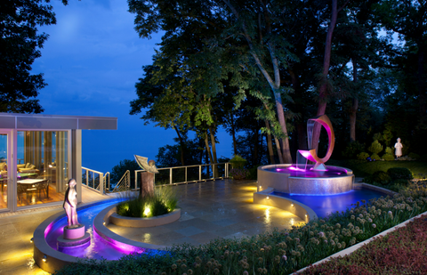 contemporary landscape with lighted fountain