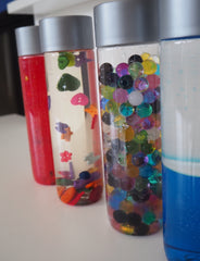 floating buttons sensory bottle
