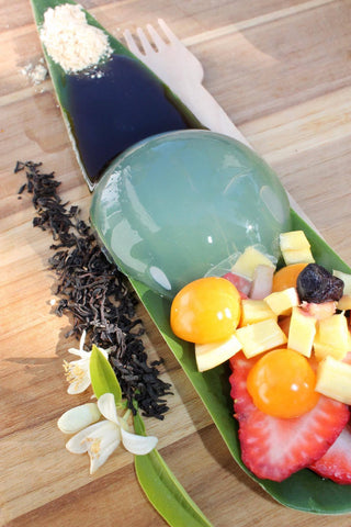 Raindrop cake with tea syrup and fresh fruit