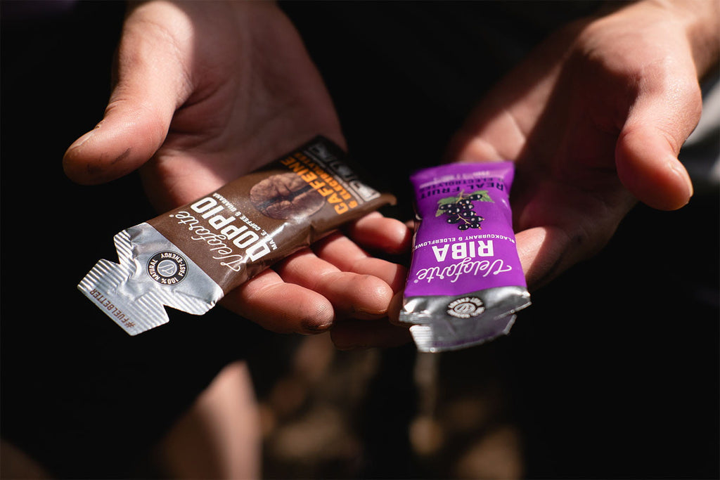 Man holding energy gels for rugby nutrition