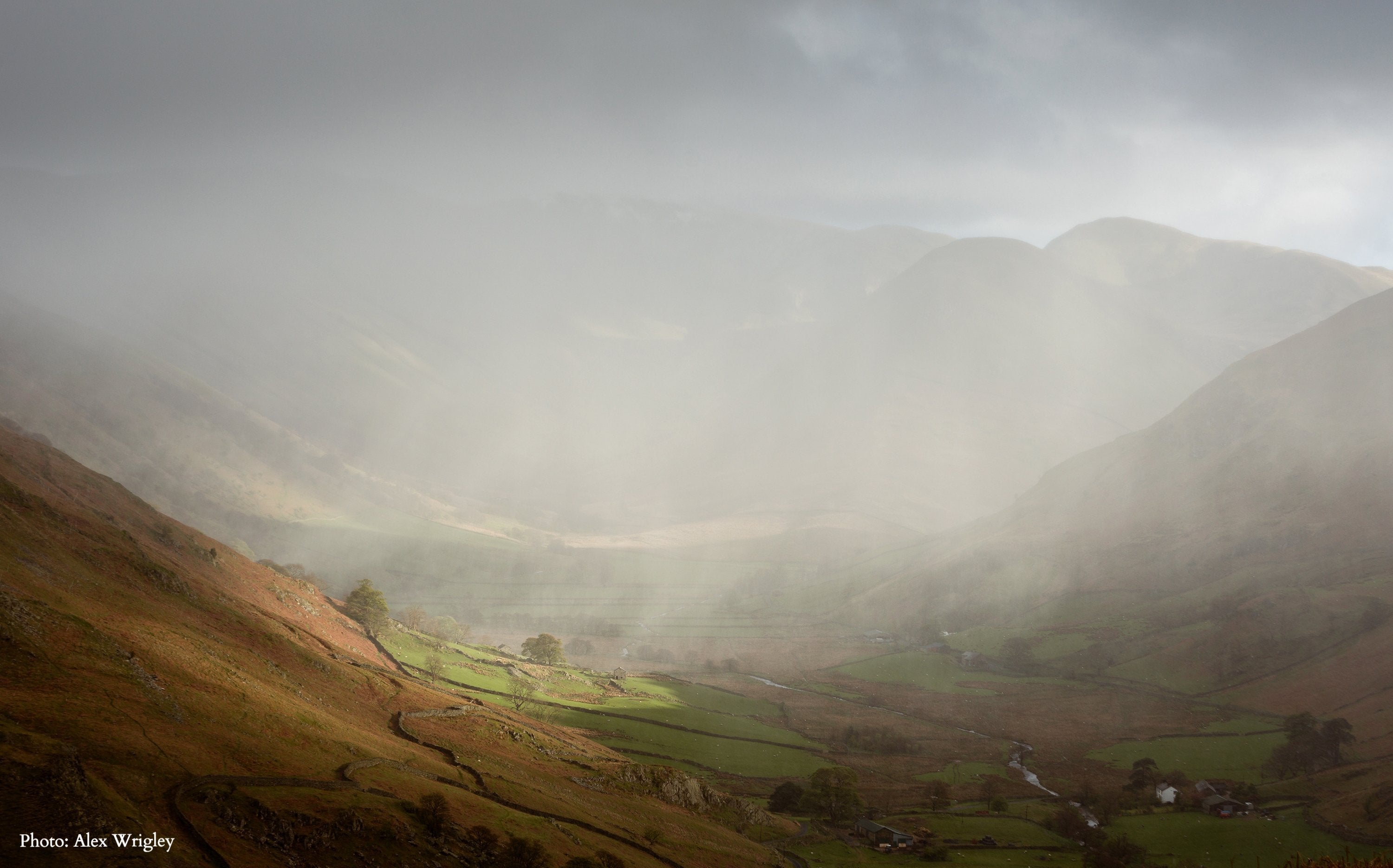 a mountain with misty weather.