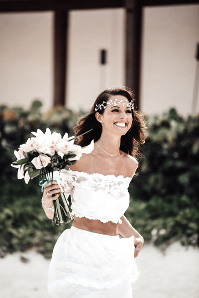 beach bride wearing two piece lace dress