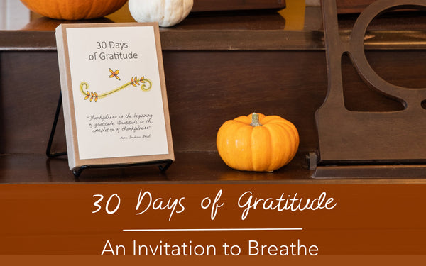 A boxed Deck of 30 Days of Gratitude Cards sitting next to a small pumpkin with the words: 30 Days of Gratitude, an Invitation to Breathe