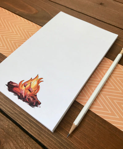 campfire illustration on a notepad