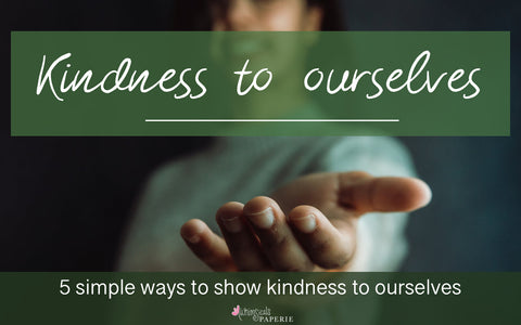 a woman holding her hand out toward the viewer with the title "Kindness to ourselves: 5 ways to show kindness to ourselves"