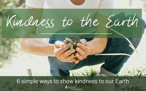 a person holding a mound of dirt with a plant in it with the title: "Kindness to the Earth, 6 simple ways to show kindness to our Earth"