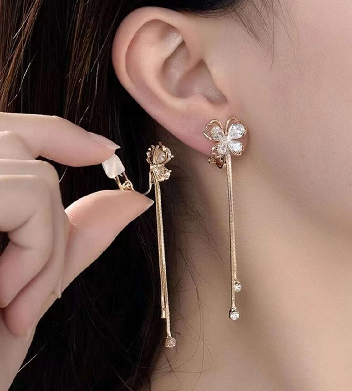 Clip on 2 3/4" gold chain and clear stone dangle butterfly earrings