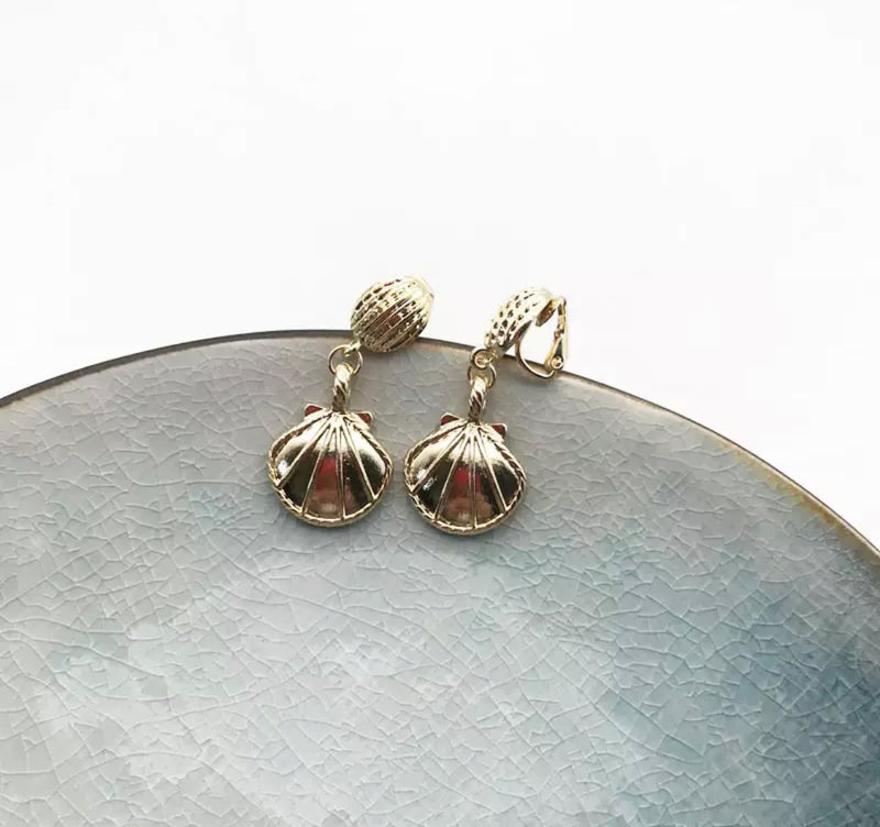 Clip on gold dangle shell earrings