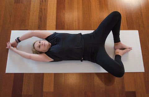 Reclining butterfly pose - yoga