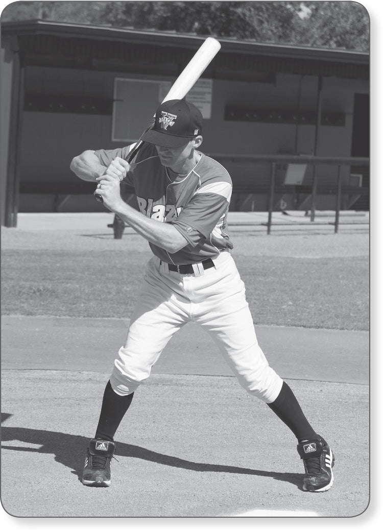 Figure 11.3 The hitter “hawking” the ball all the way back into the catcher’s mitt.