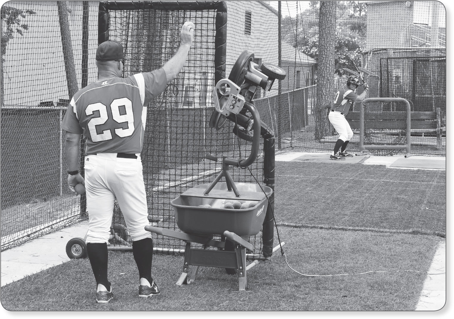 Figure 11.4 The outdoor tunnel can be used for a variety of drills, including two strike hitting off of a live arm or hitting curveballs off of a machine.