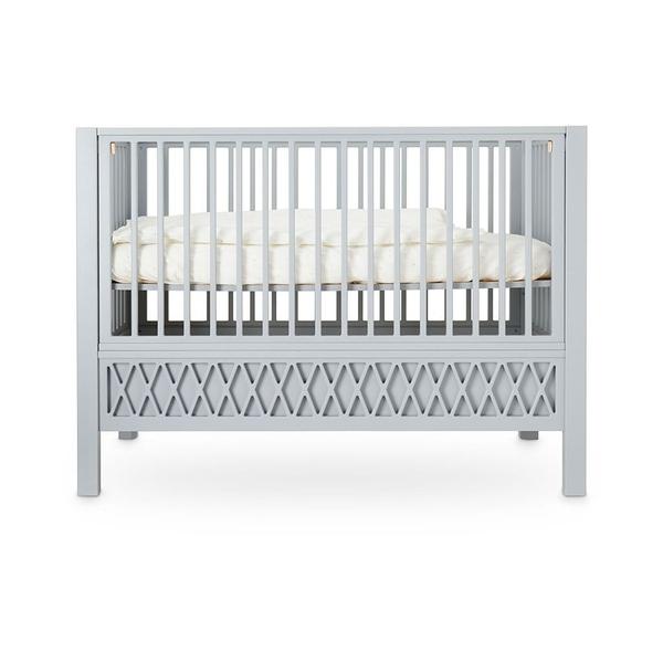 white and grey cot bed