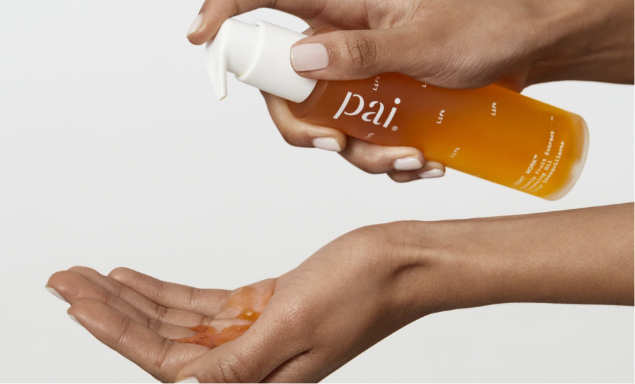  Woman using Pai Skincare Light Work Cleansing Oil