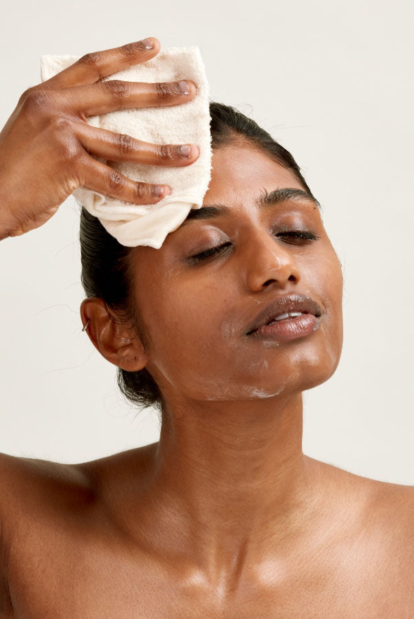 Woman removing skincare