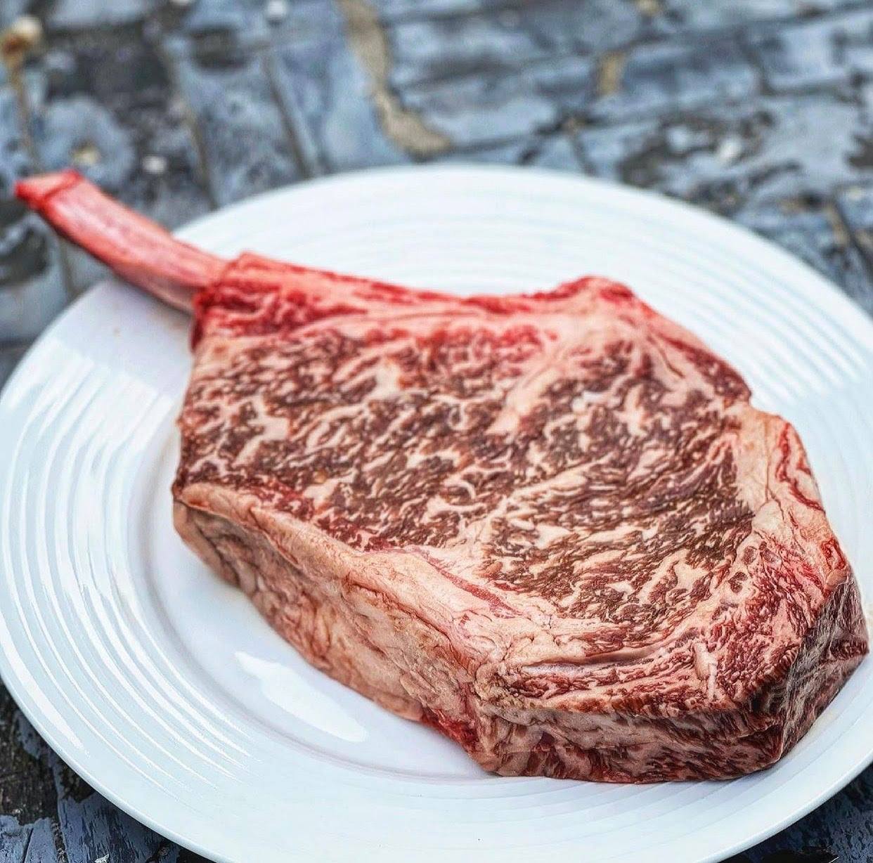 Bone-in Ribeye (Marble Score: - Second City Steak and Seafood