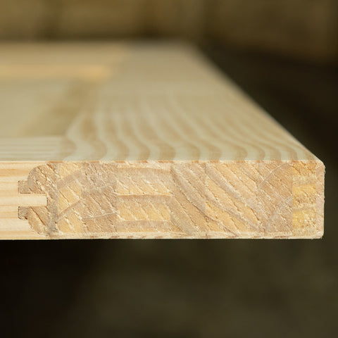 Closeup of solid wood bottom of Knotty Pine Door