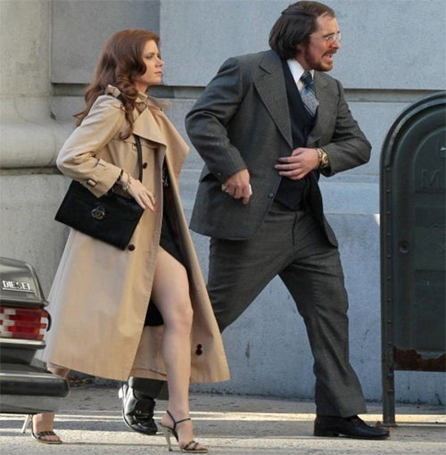 Amy Adams is carrying a Dressing Vintage Gucci Vintage handbag in American Hustle