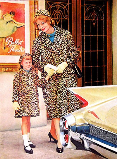 Mother - Daughter matching leopard coats in a Cadillac Ad