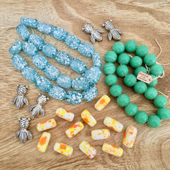 Japanese glass beads and koi fish charms at Island Cove
