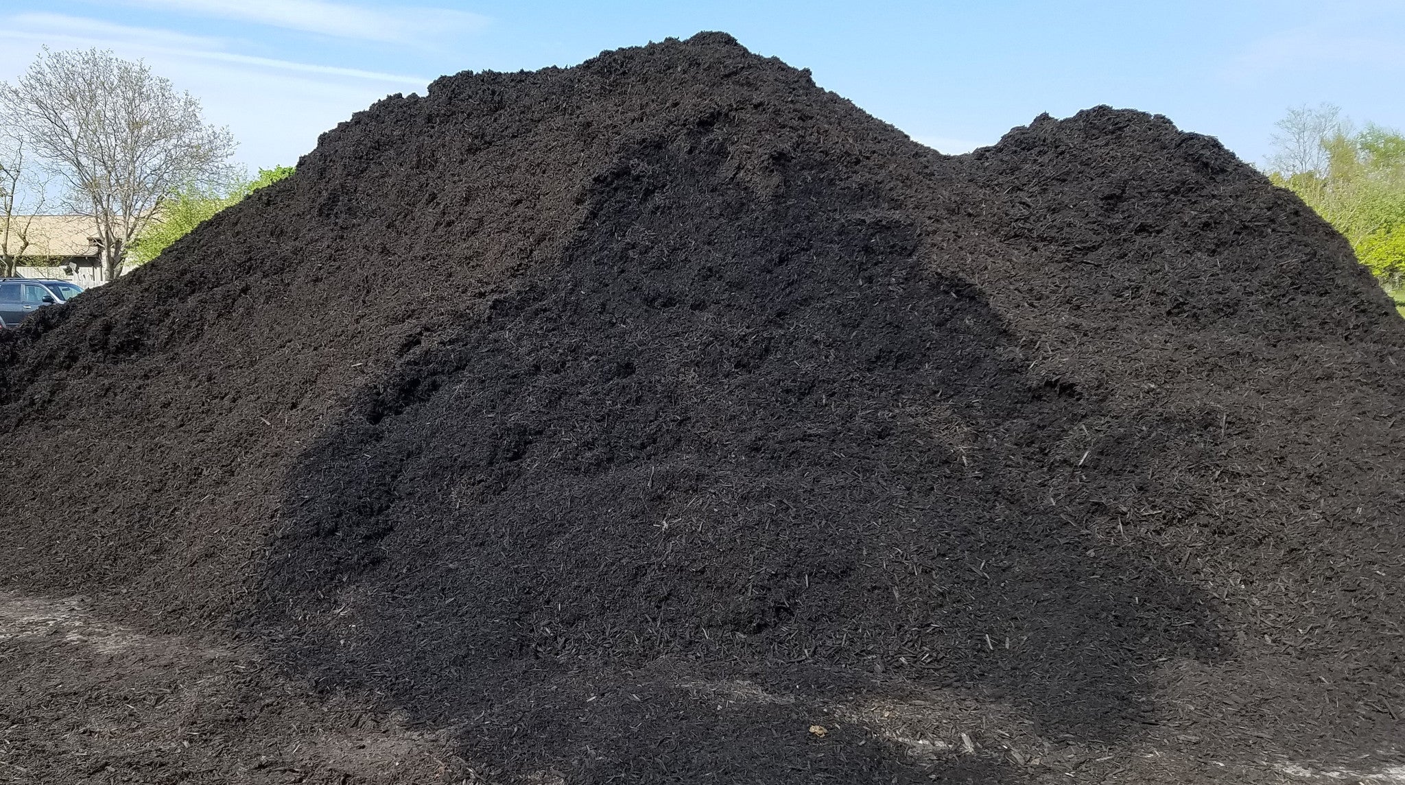 Image of Black mulch bulk in garden