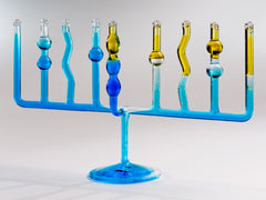 Contemporary Judaica, hand crafted glass Menorah, oil floating over water, blue color dissolves