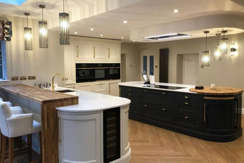 A modern kitchen with an integrated wine cooler