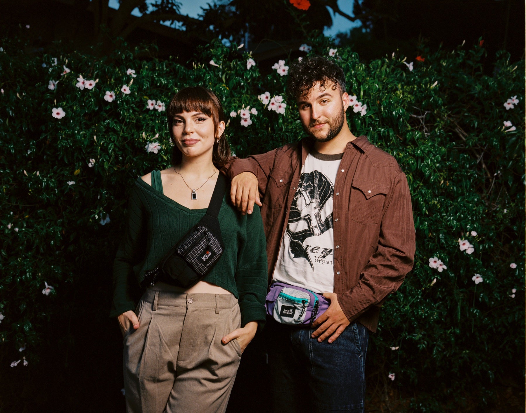 Two people wearing a Long Weekend Monterey Sling