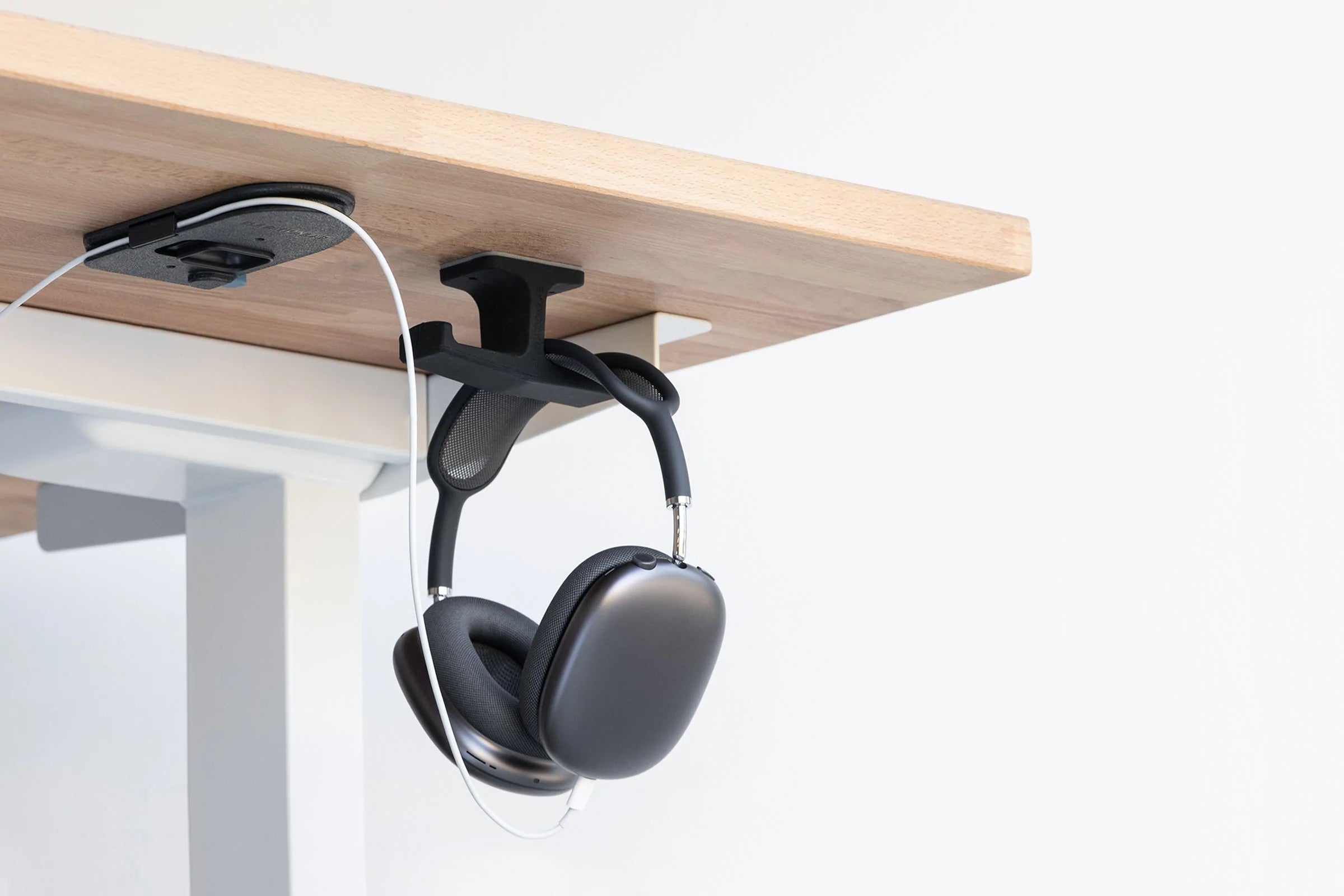 Under desk cord organiser and headphone stand